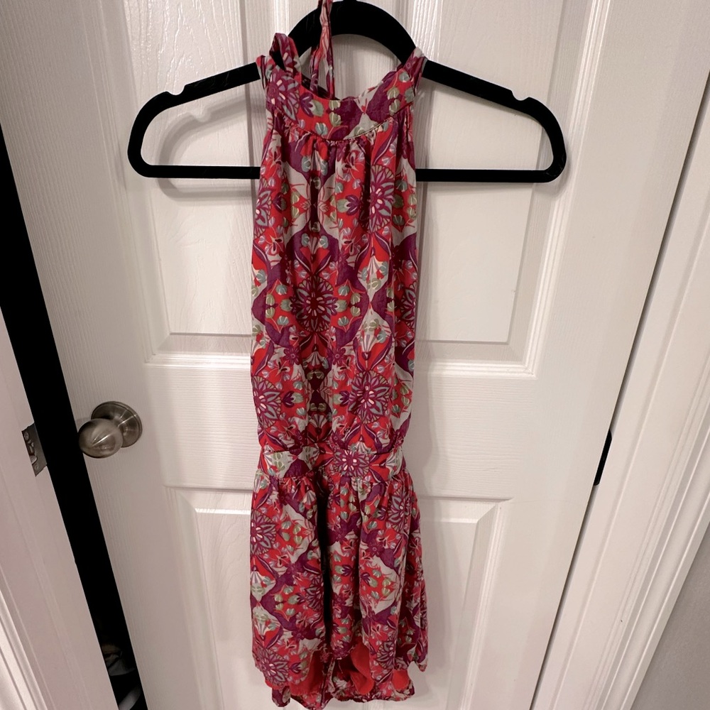 Free people open back romper!